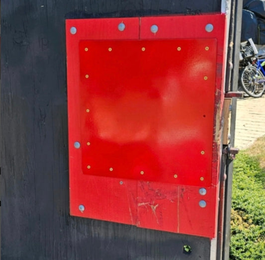 Replacement strike plate mounted to oak plates